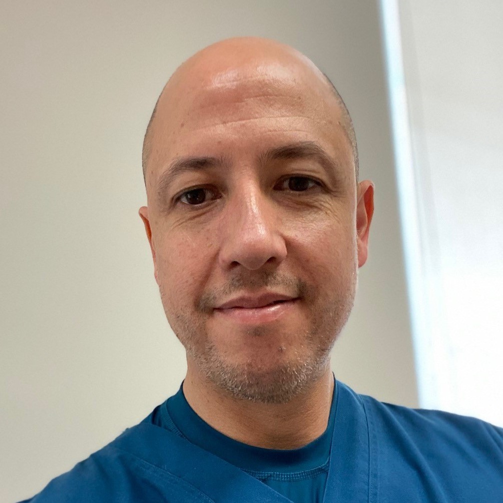 Carlos Acuña, M.D.
